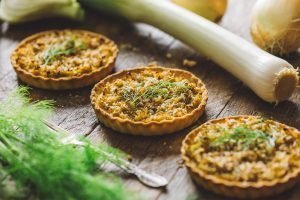 CREAM CHEESE TARTS WITH CARAMELIZED ONIONS, FENNEL AND LEEKS